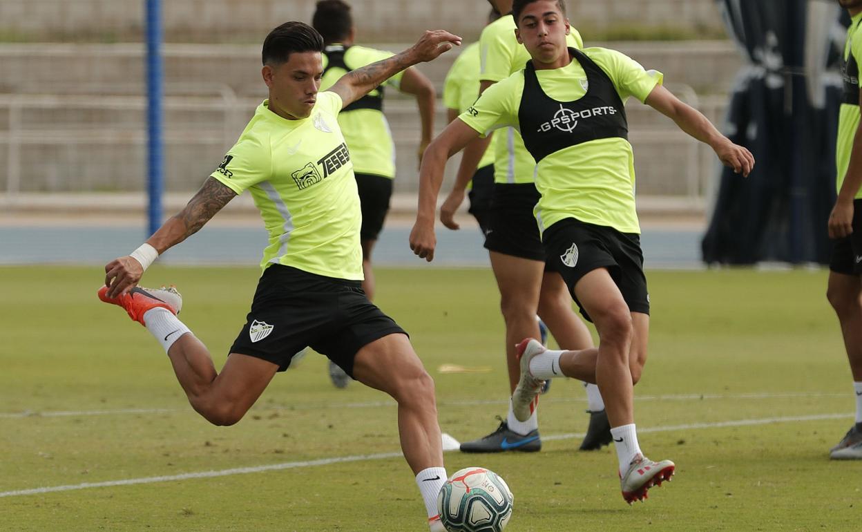 Renato y el canterano Cristo, en un entrenamiento.