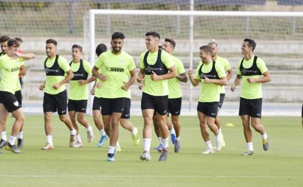 Juande a la izquieda y Diego a la derecha, juntos en uno de los ejercicios del entrenamiento de este viernes.