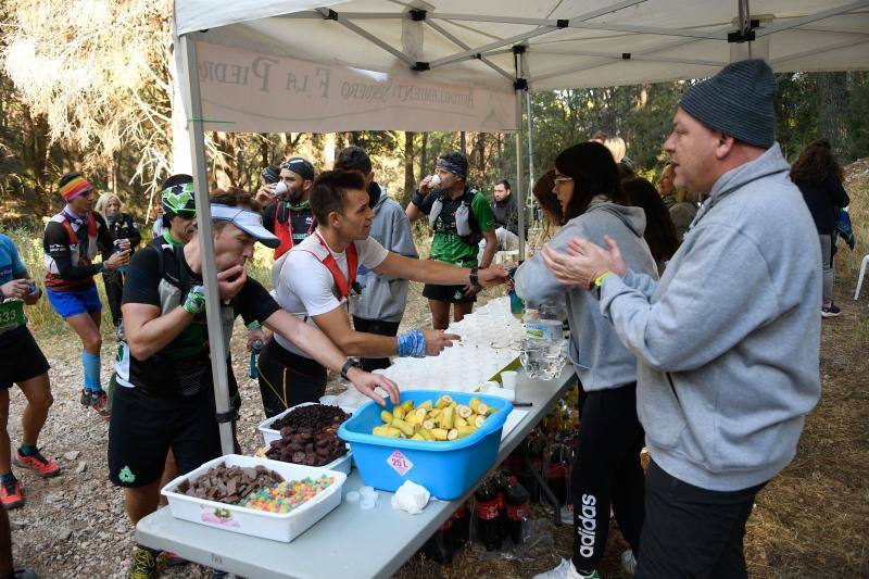 Imágenes de la 18ª edición del mítico recorrido por la sierra alhaurina donde han participado un total de 1.450 corredores 