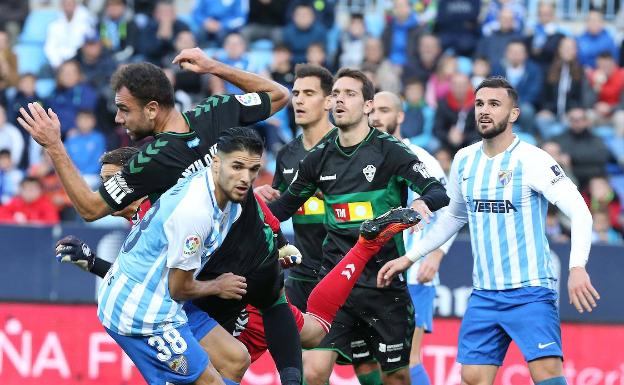 Antoñín y Sadiku, en el partido ante el Elche. 