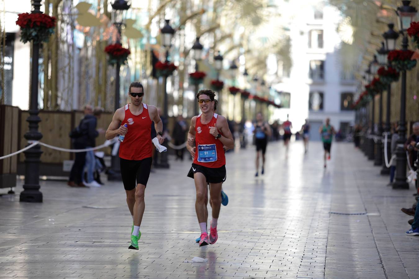 Los corredores, en calle Larios