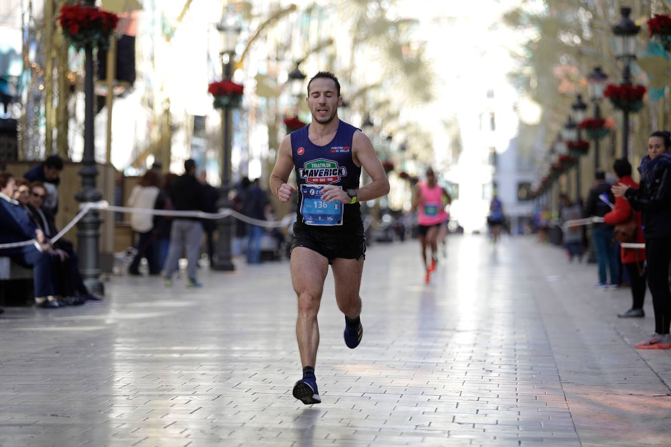 Los corredores, en calle Larios