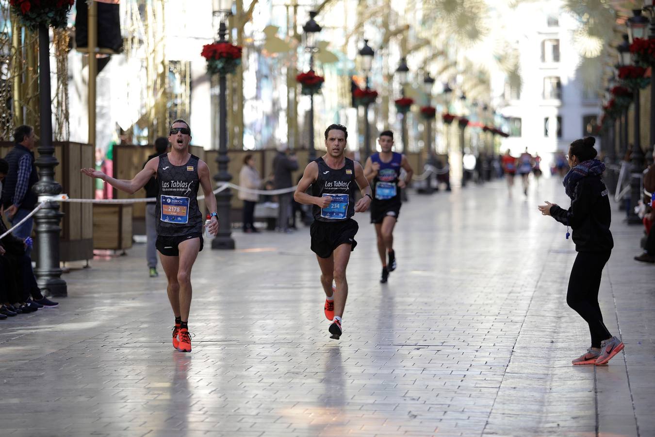 Los corredores, en calle Larios