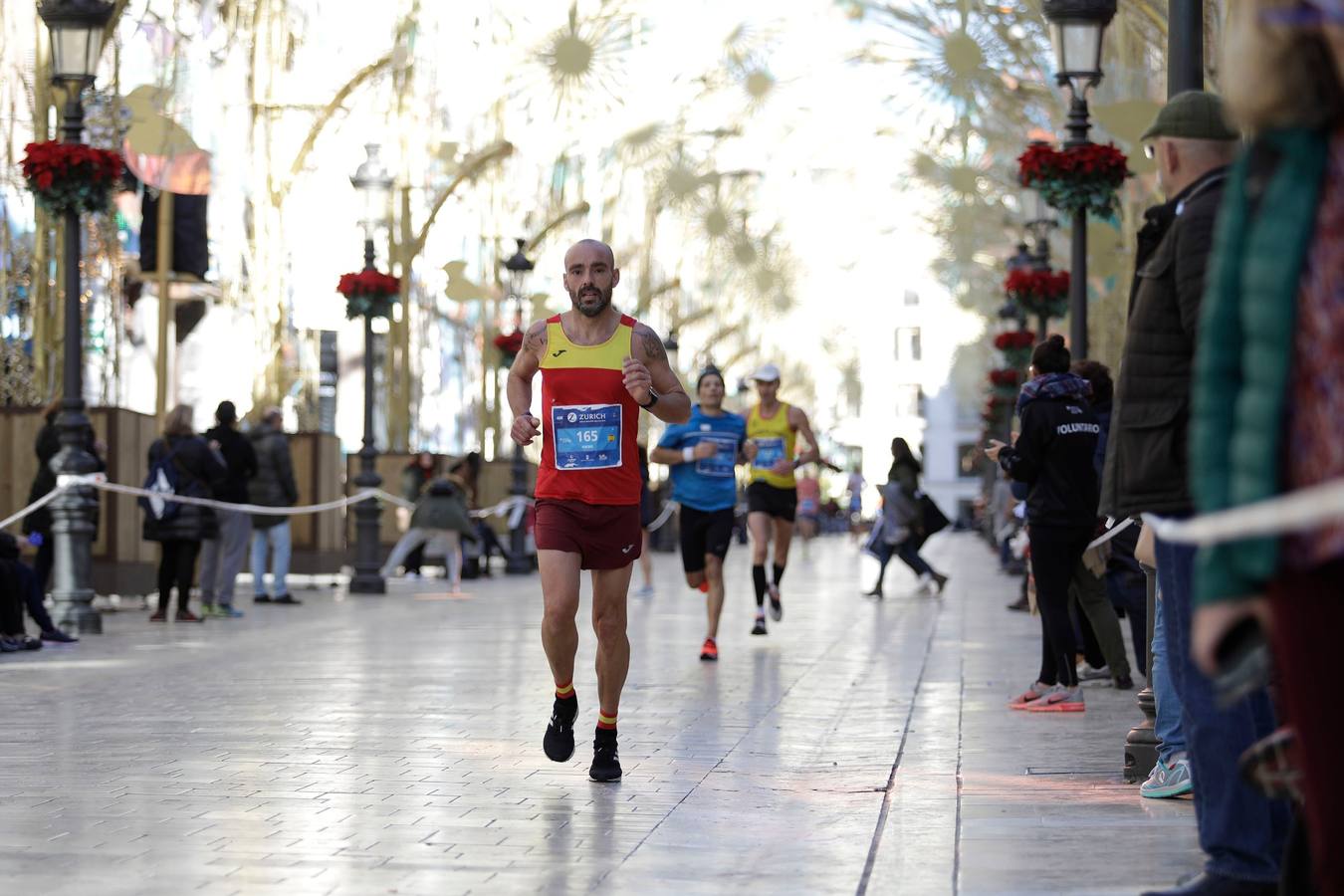 Los corredores, en calle Larios