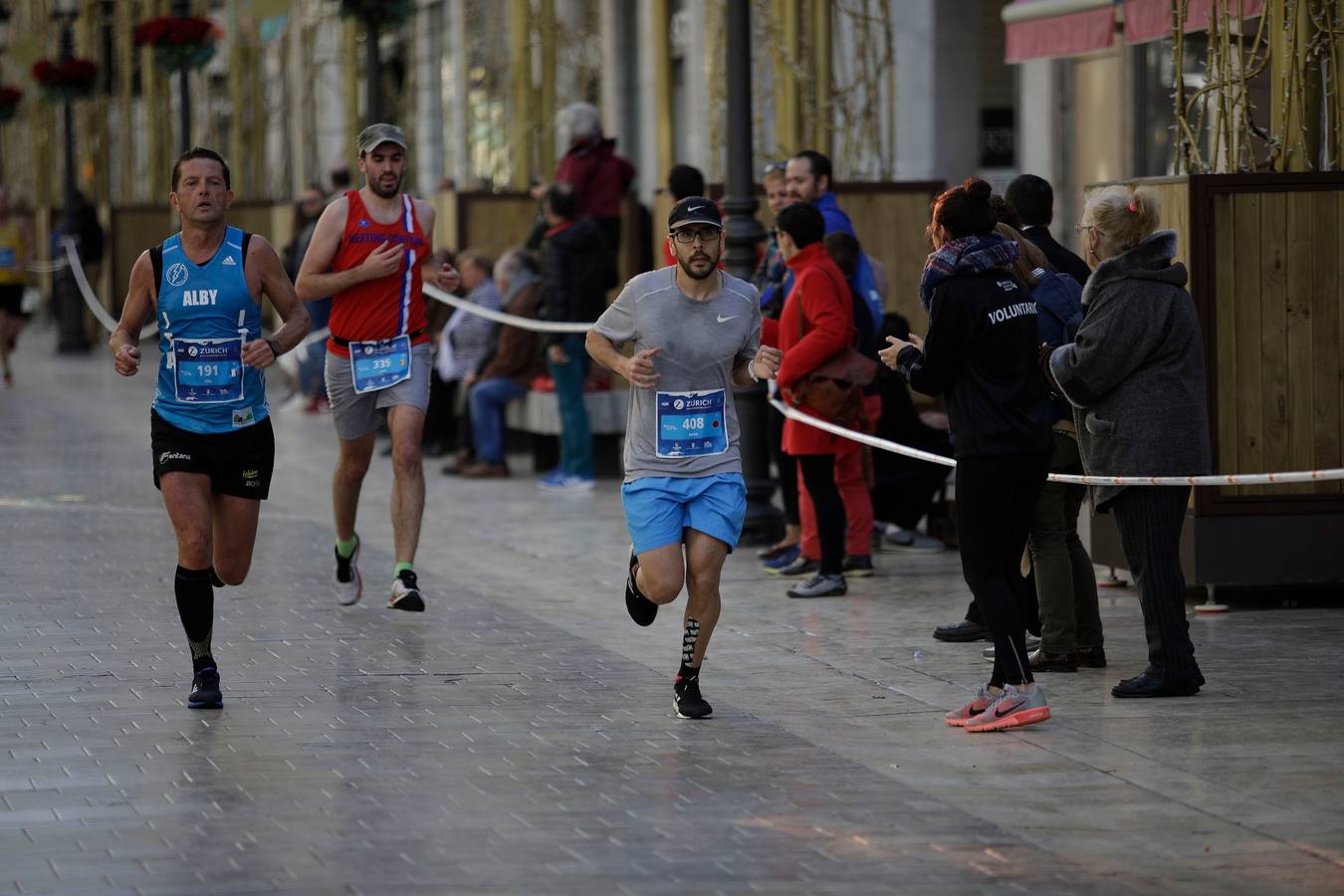 Los corredores, en calle Larios