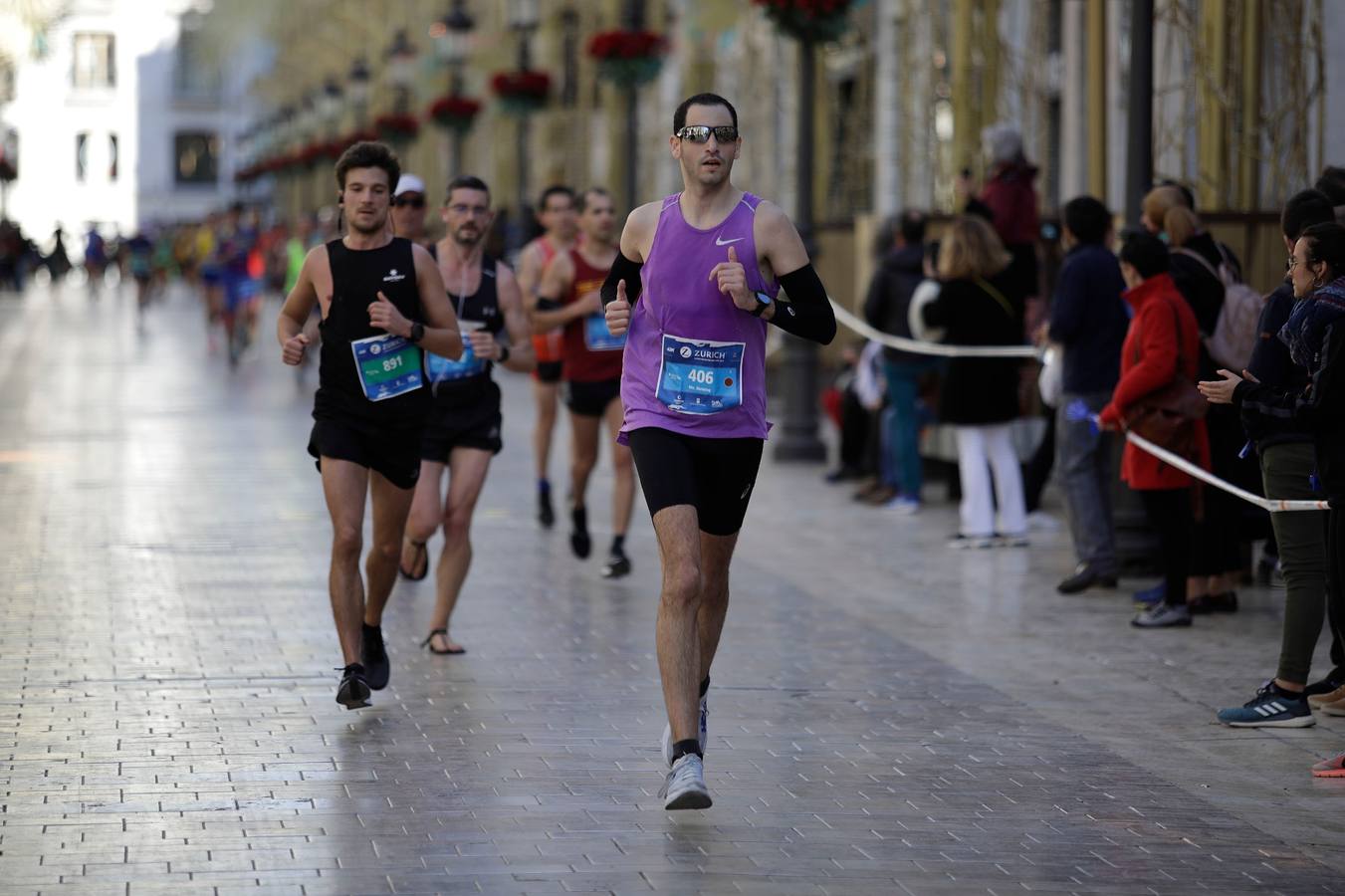 Los corredores, en calle Larios