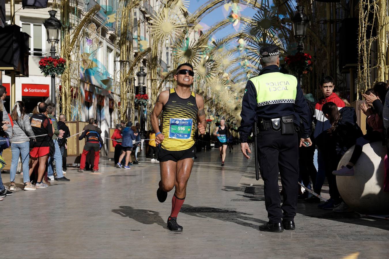 Los corredores, en calle Larios