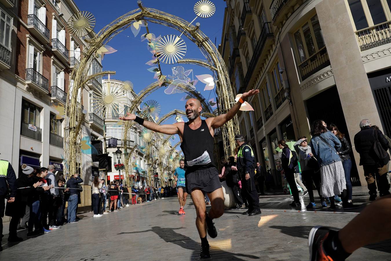 Los corredores, en calle Larios