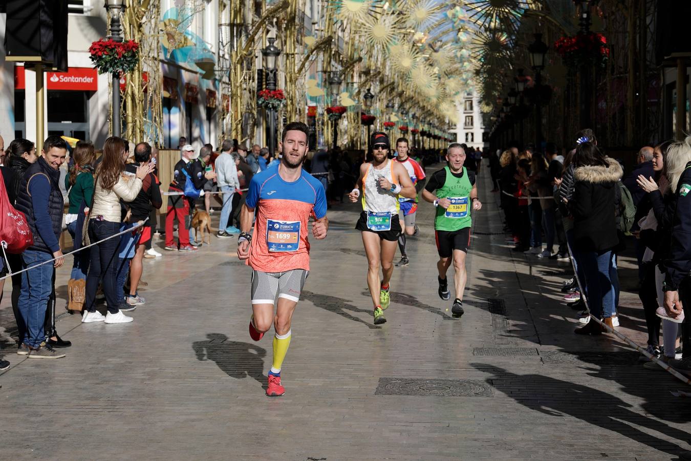 Los corredores, en calle Larios