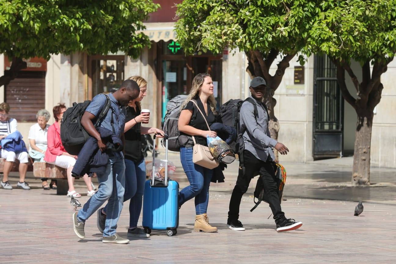 Grupo de turistas por el Centro