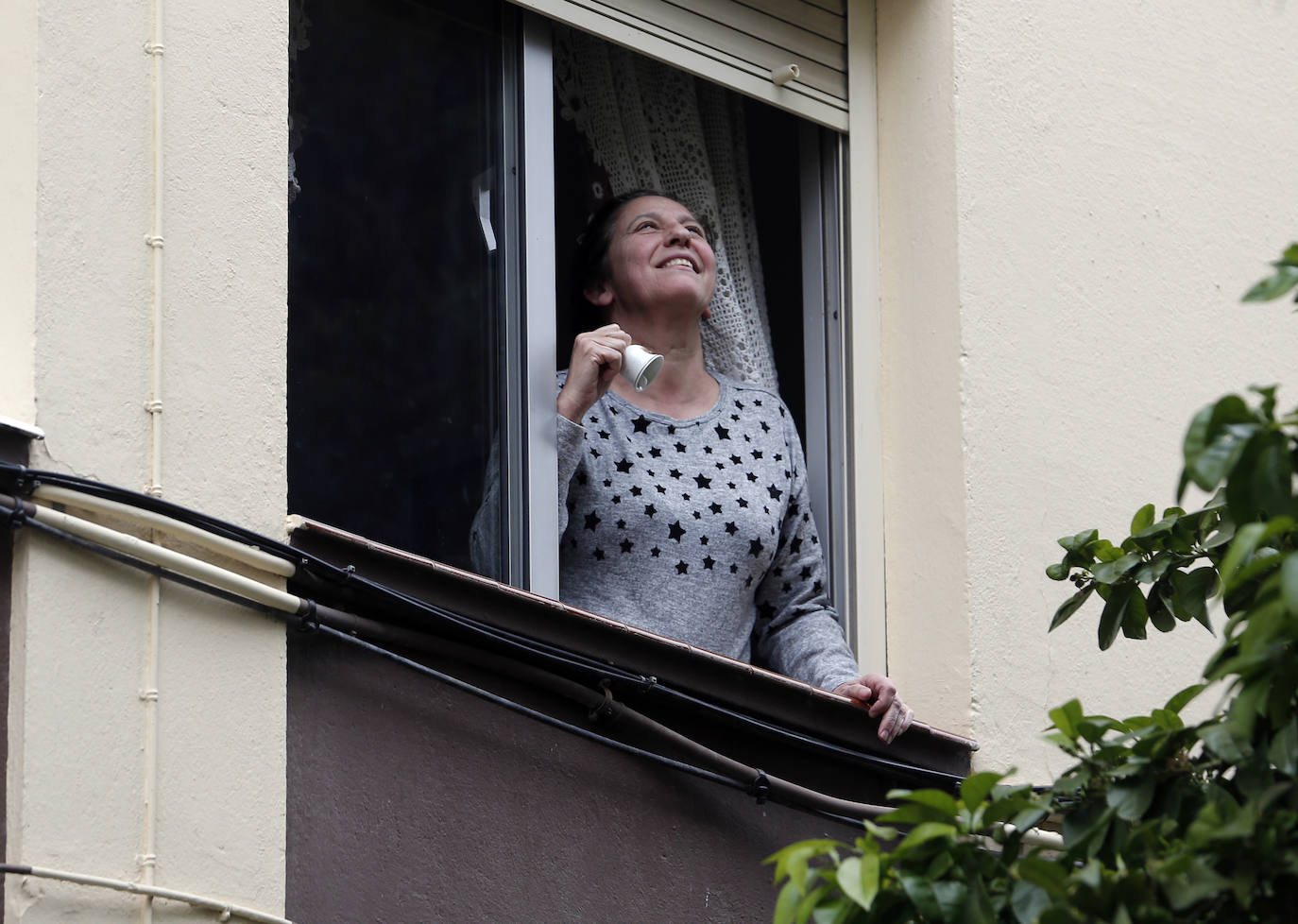 Fotos: Los vecinos de Nueva Málaga homenajean a la Cofradía de Nueva Esperanza