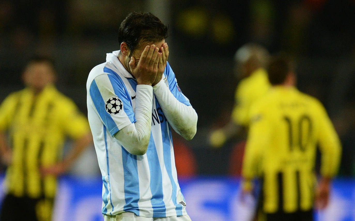 La injusta eliminación del Málaga en la Champions en el campo del Dortmund cumple hoy siete años con las mismas dudas que el primer día. Revive aquel momento foto a foto.