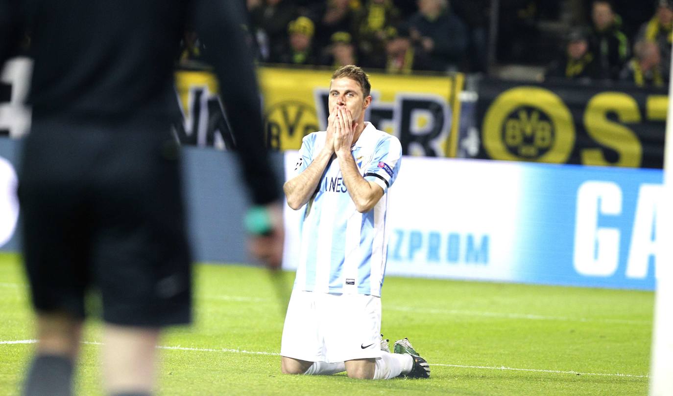 La injusta eliminación del Málaga en la Champions en el campo del Dortmund cumple hoy siete años con las mismas dudas que el primer día. Revive aquel momento foto a foto.