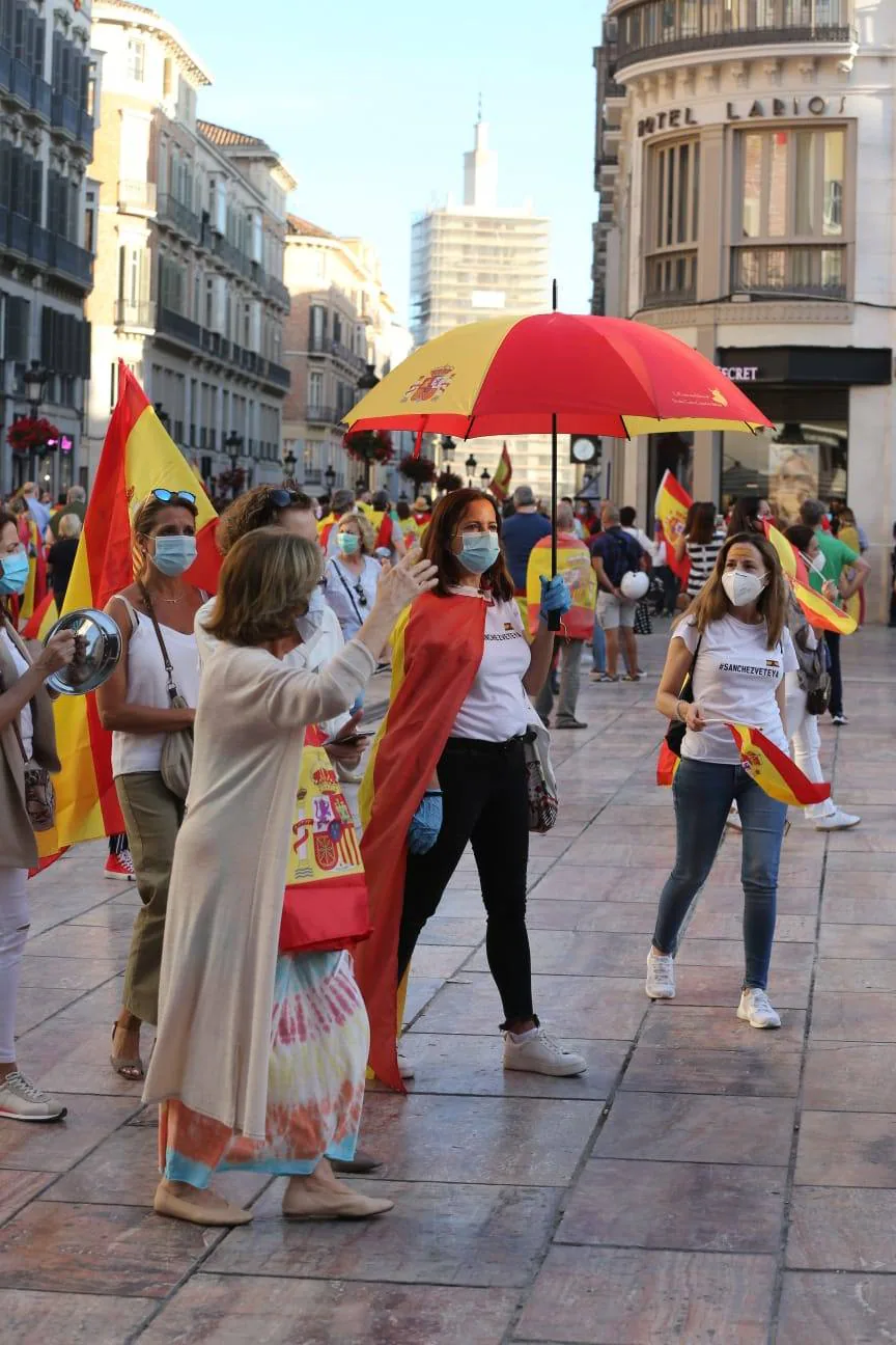 Decenas de personas llenaron calle Larios en la protesta 