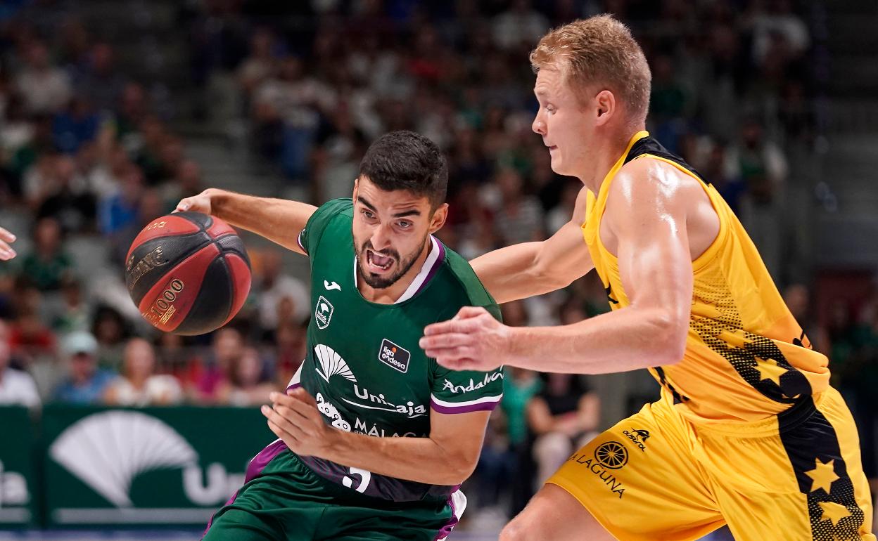 Jaime Fernández y Salin en el partido entre el Unicaja y el Tenerife disputado en el Palacio de los Deportes. 