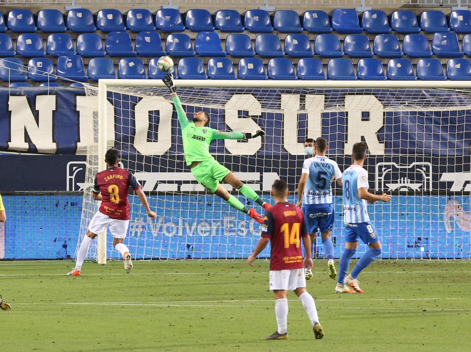 Todos los momentos del partido en imágenes desde La Rosaleda, que por segunda vez abre sus puertas para el fútbol pero sin aficionados en las gradas. 