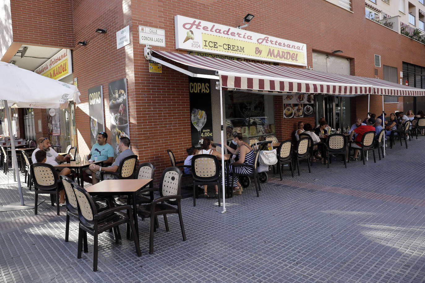 Fotos: La hostelería de los distritos, en auge este verano