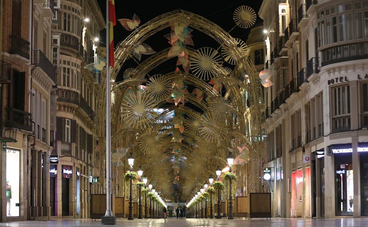 La calle Larios de Málaga, en la primera noche de toque de queda. 