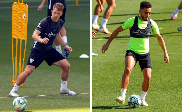 Los exjugadores del Málaga, Esteban Rolón (i) y Badr Boulahroud (d), durante la temporada pasada. 