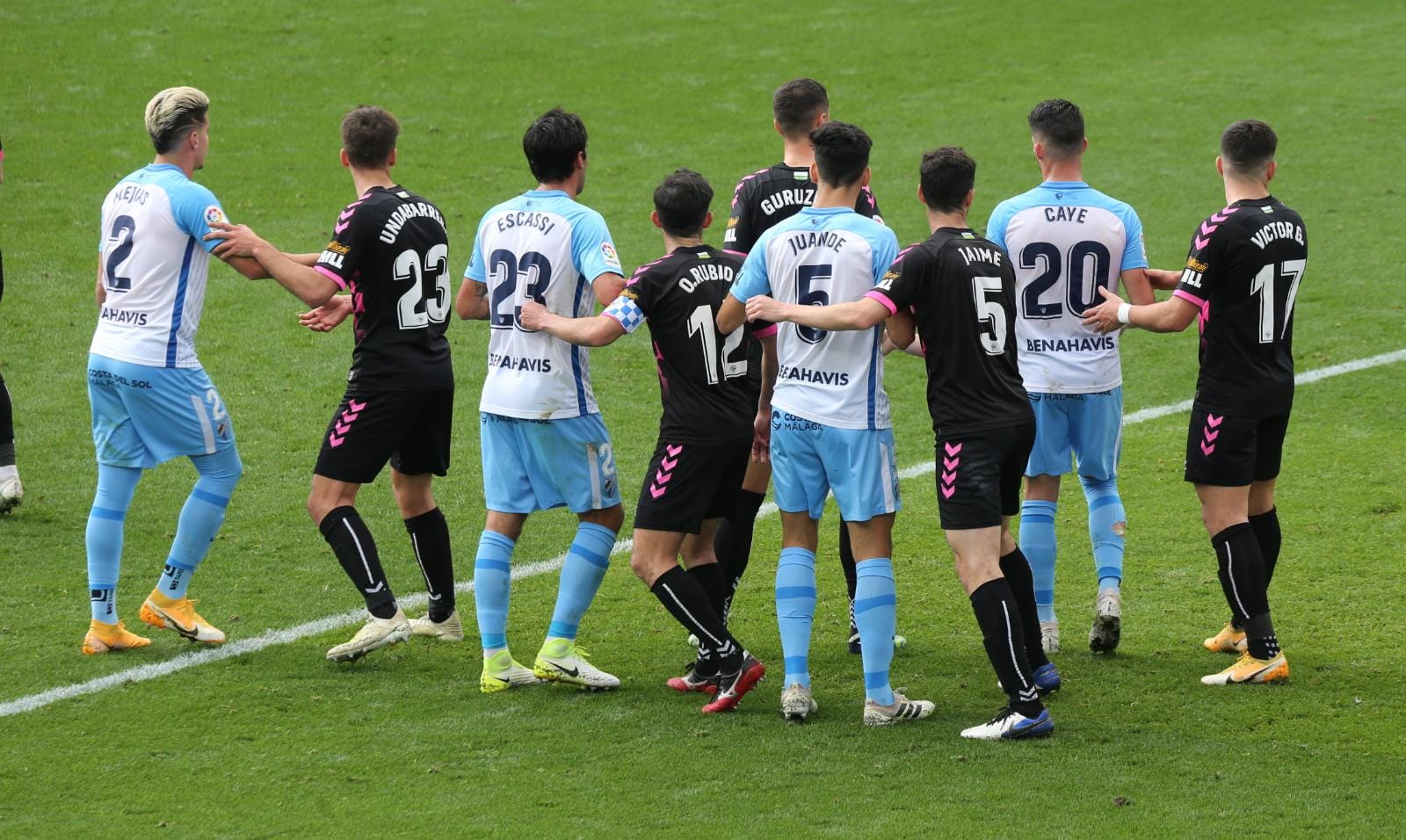 El encuentro en la Rosaleda, en imágenes