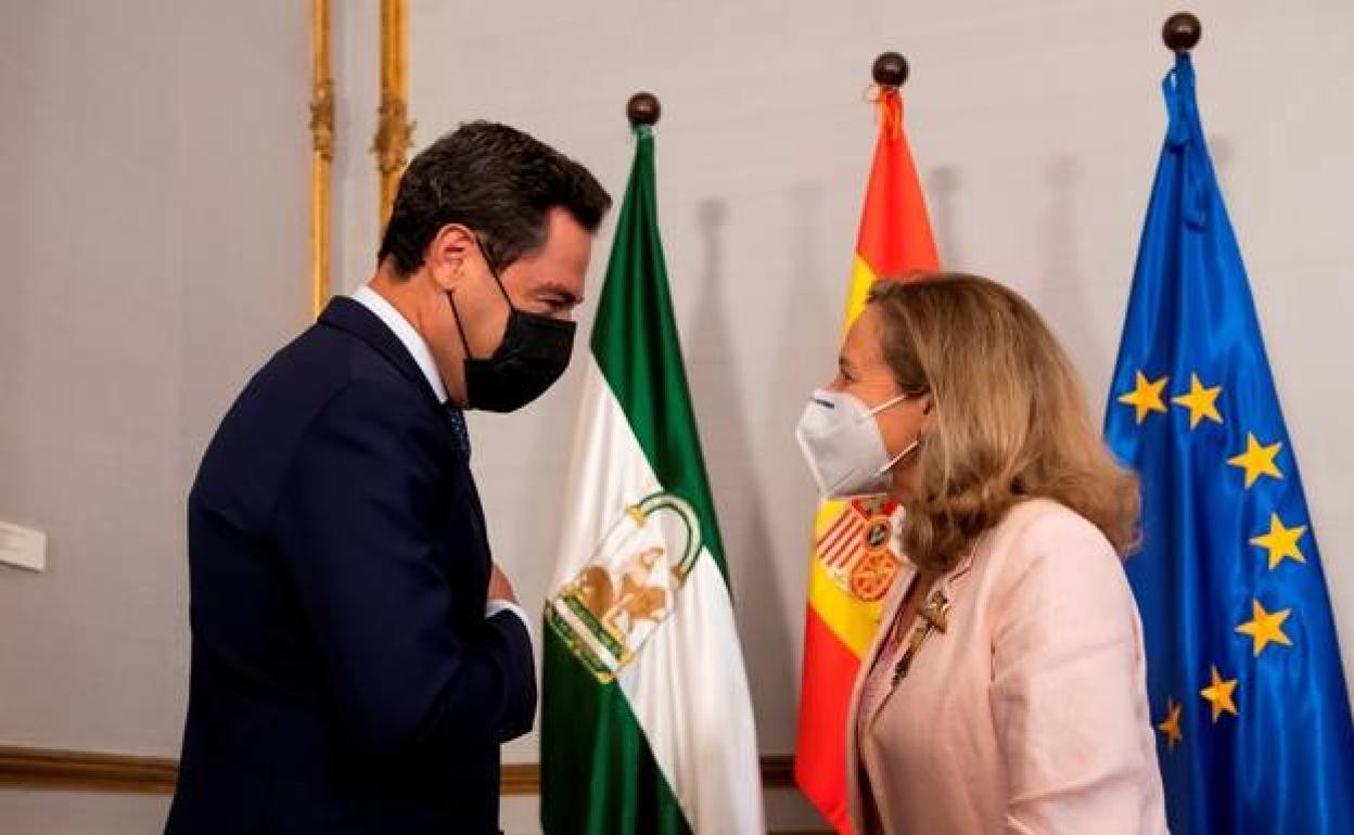 Juanma Moreno y Nadia Calviño, en un reciente encuentro en Sevilla.