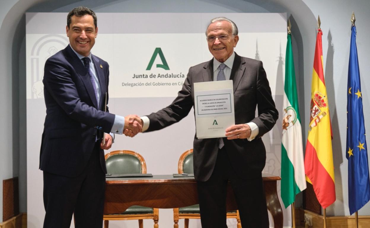 Juanma Moreno con el presidente de la Fundación La Caixa, Isidro Fainé.
