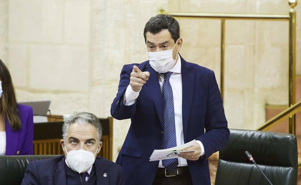 El presidente de la Junta, Juanma Moreno, durante su intervención. 