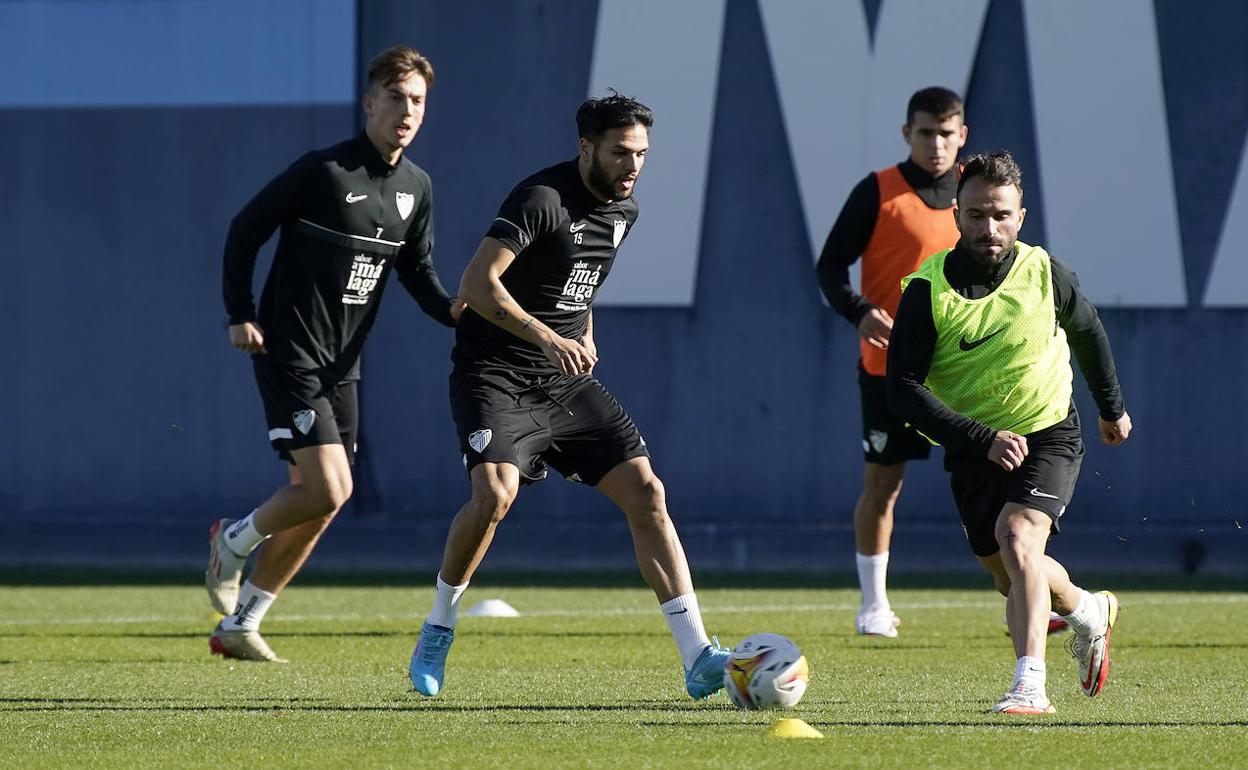 Paulino, Antoñín, Víctor Gómez y Javi Jiménez, en el entrenamiento de hoy. 