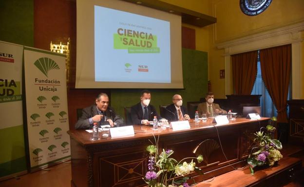 Ángel Escalera, Manuel Dorado, Miguel Ángel Martínez y Enrique Gómez, ayer en el salón de actos de Unicaja.