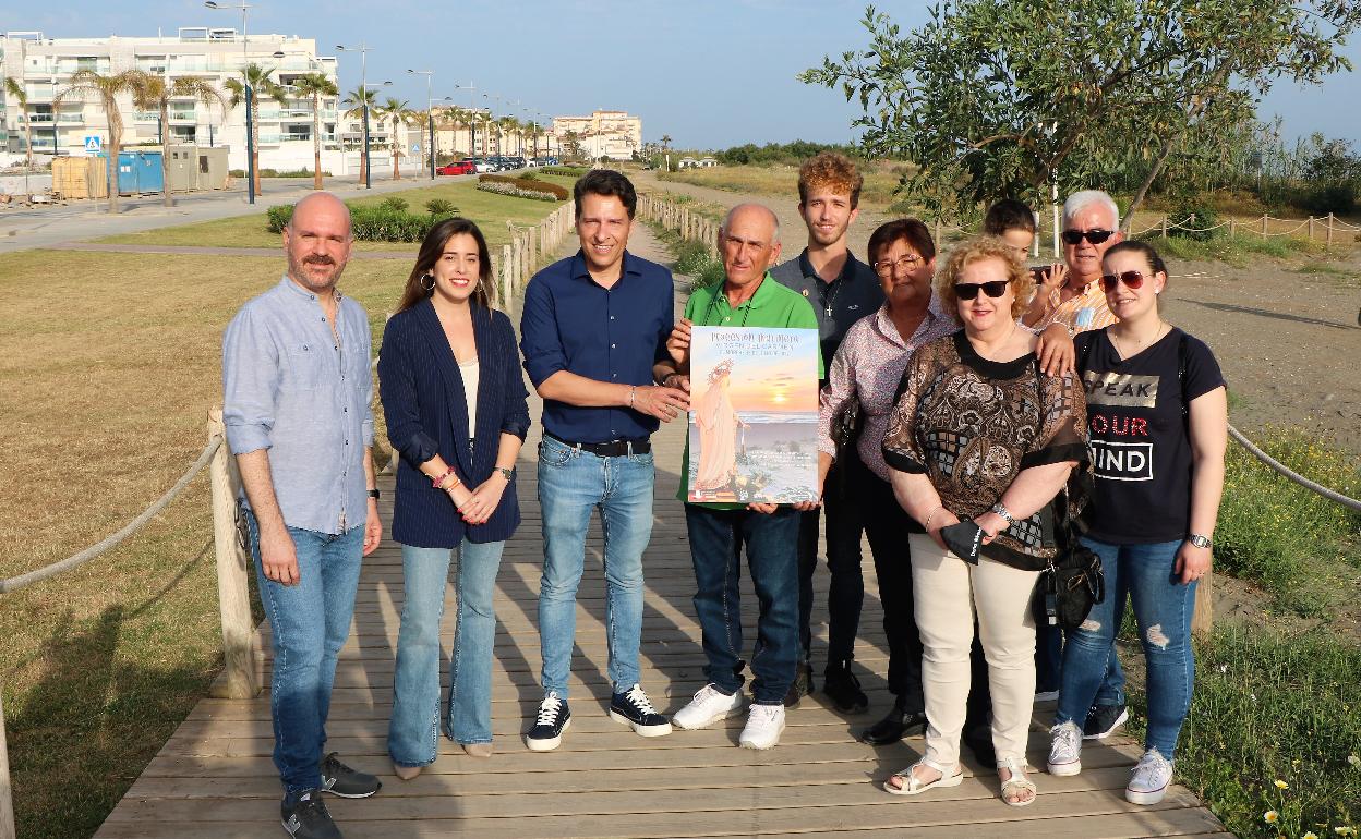 Acto de presentación de la procesión extraordinaria en la Senda Litoral de El Morche. 