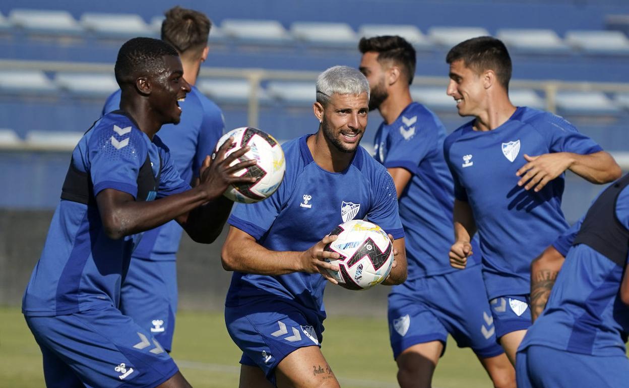 Moussa y Fran Sol, en el entrenamiento de este jueves en el campo de la Federación. 