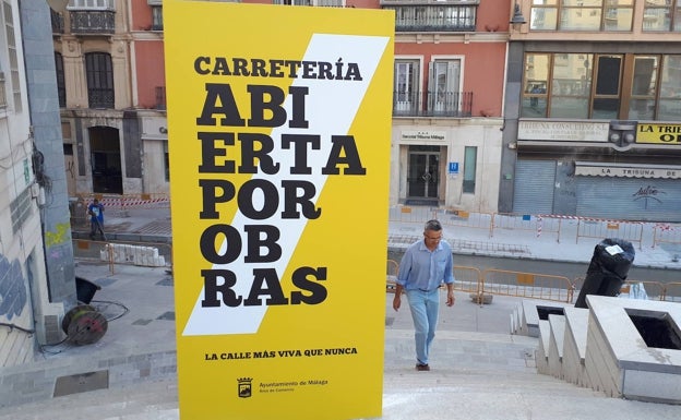 Cartel instalado por el Ayuntamiento para tratar de incentivar las compras en la calle. 