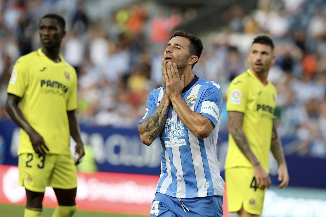 Buen ambiente en La Rosaleda en el estreno de Pepe Mel en el banquillo 