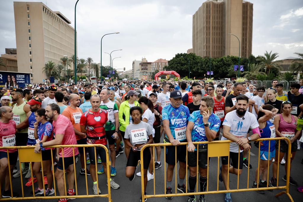 Casi 11.000 atletas participan este domingo en esta prueba que discurre por la capital malagueña.