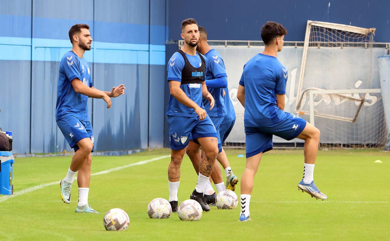 Luis Muñoz, Fran Sol y Andrés Caro en un entrenamiento reciente en el Anexo de La Rosaleda.