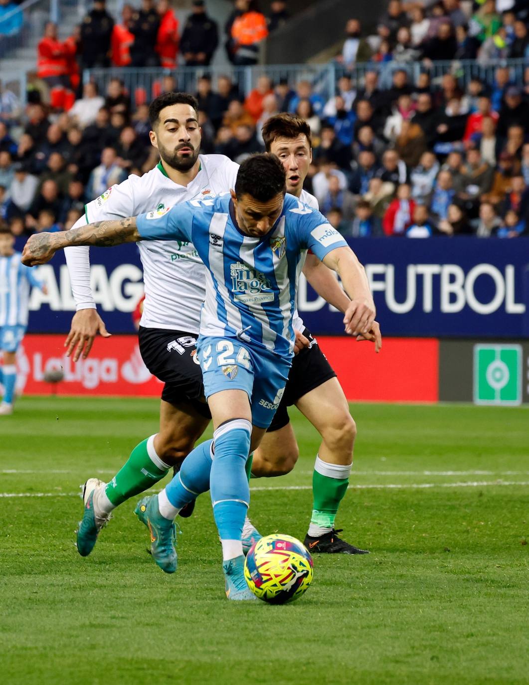 La derrota del Málaga ante el Racing, en imágenes