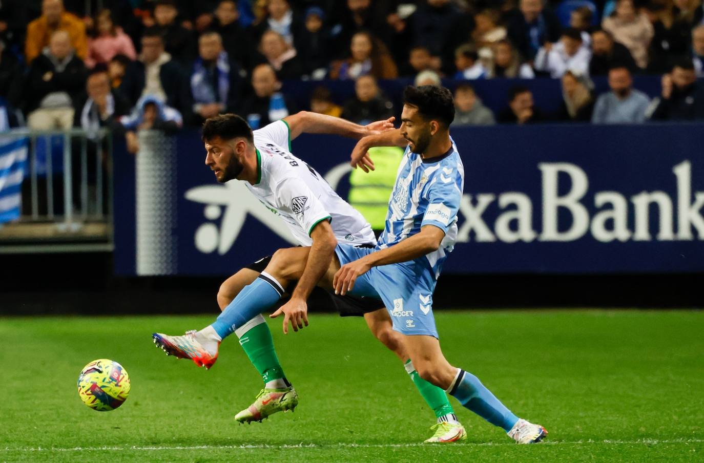 La derrota del Málaga ante el Racing, en imágenes