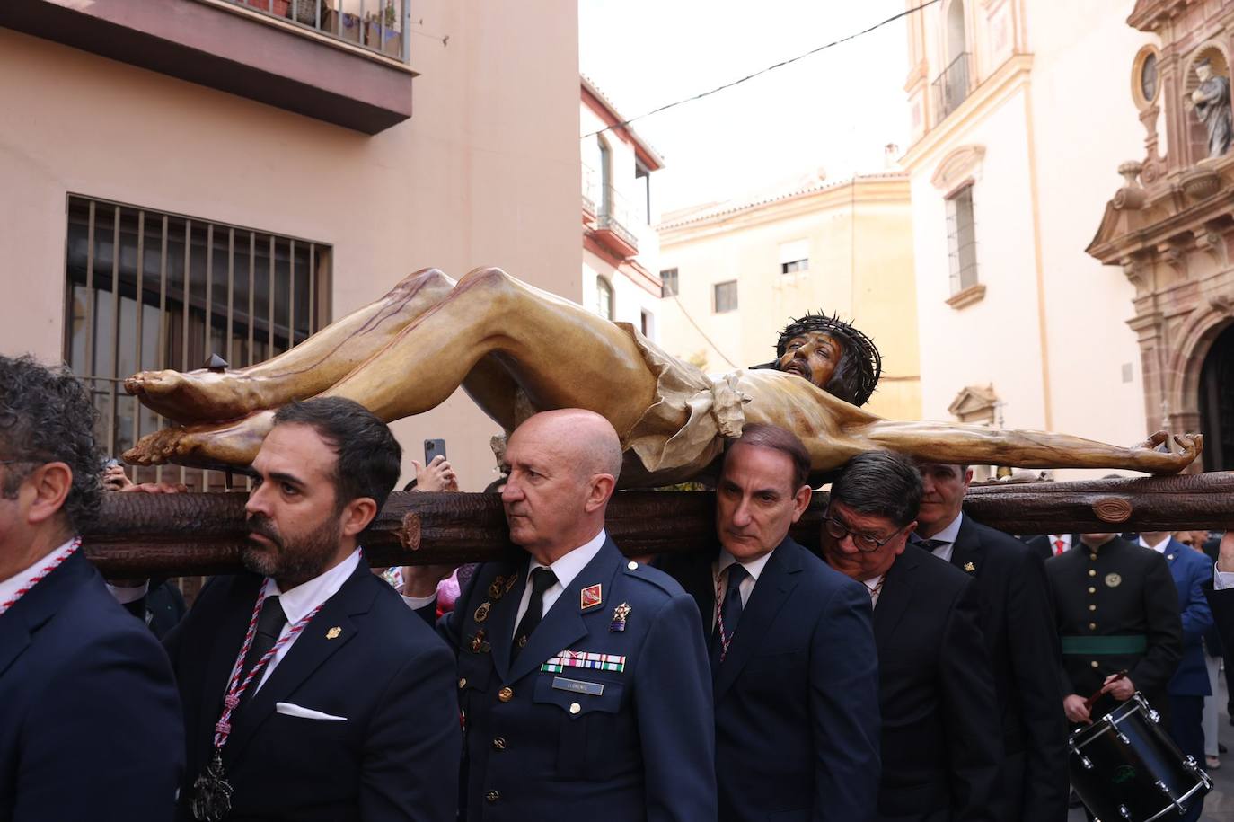 Traslado de los titulares de la Archicofradía de la Sangre desde la parroquia de San Felipe Neri a la casa hermandad, este domingo 26 de marzo