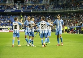 Los jugadores malaguistas celebran el segundo gol ante el MIrandés.