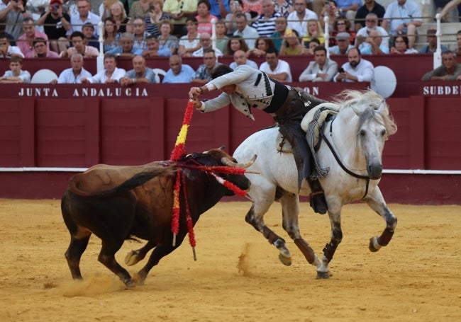Cartagena, en un par a dos manos con el caballo sin el cabezal.