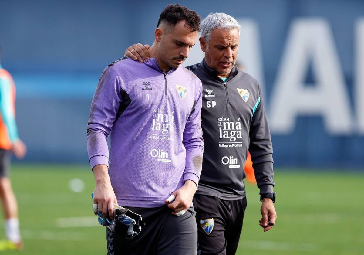 Alfonso Herrero y Pellicer dialogan en un entrenamiento.