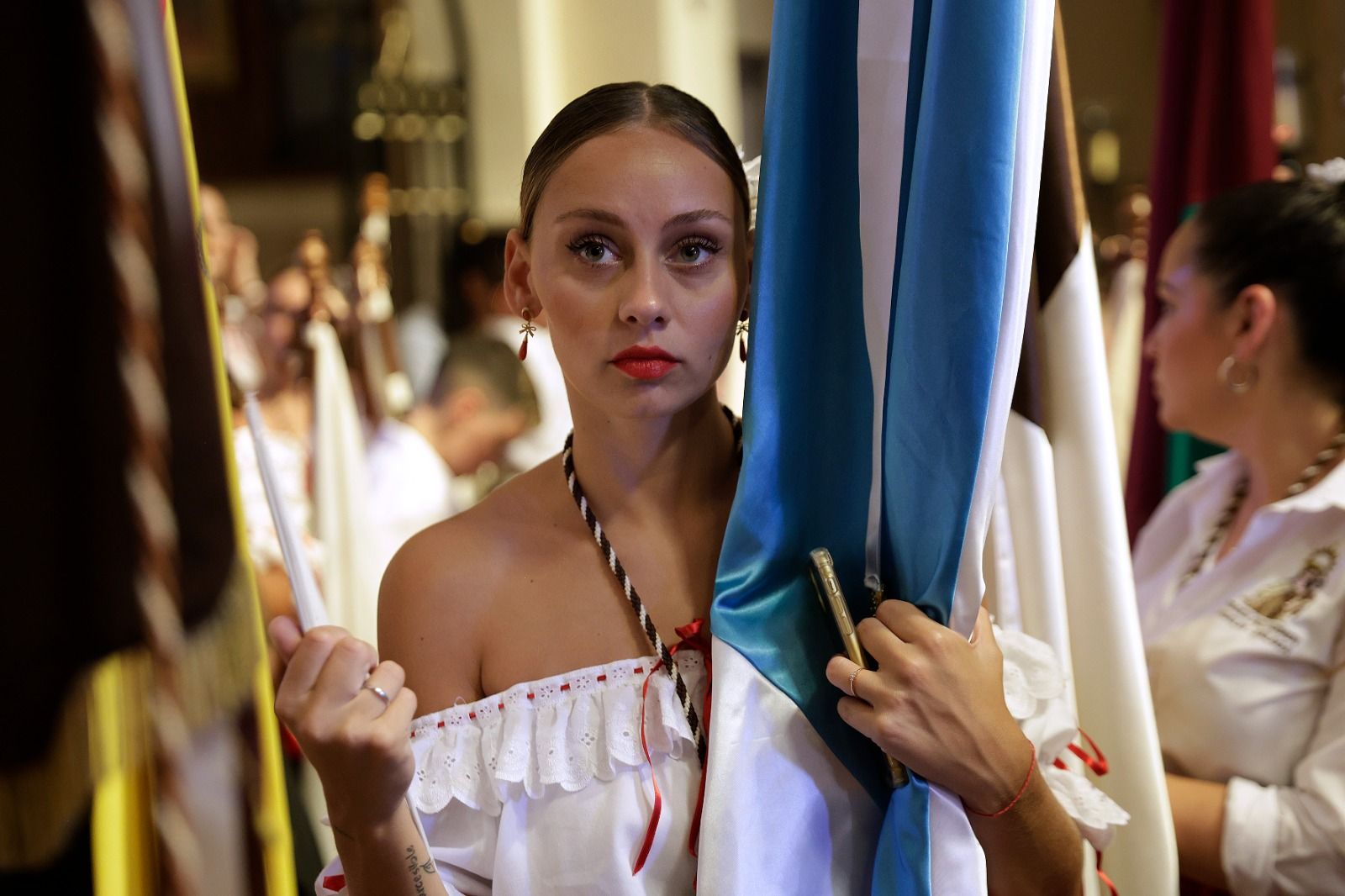 La procesión de la Virgen del Carmen de Huelin, en imágenes