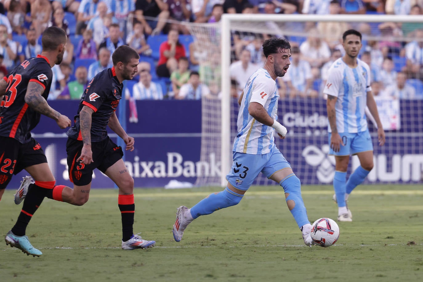 El Málaga-Huesca, en imágenes