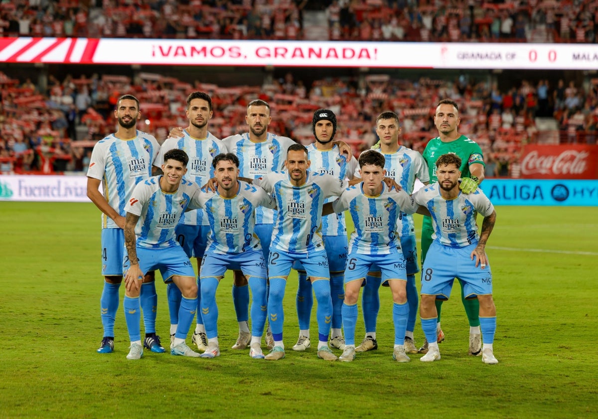 El once del Málaga en el partido frente al Granada en el Nuevo Los Cármenes.