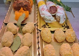 Croquetas de lomo en manteca y salchichón de Málaga.