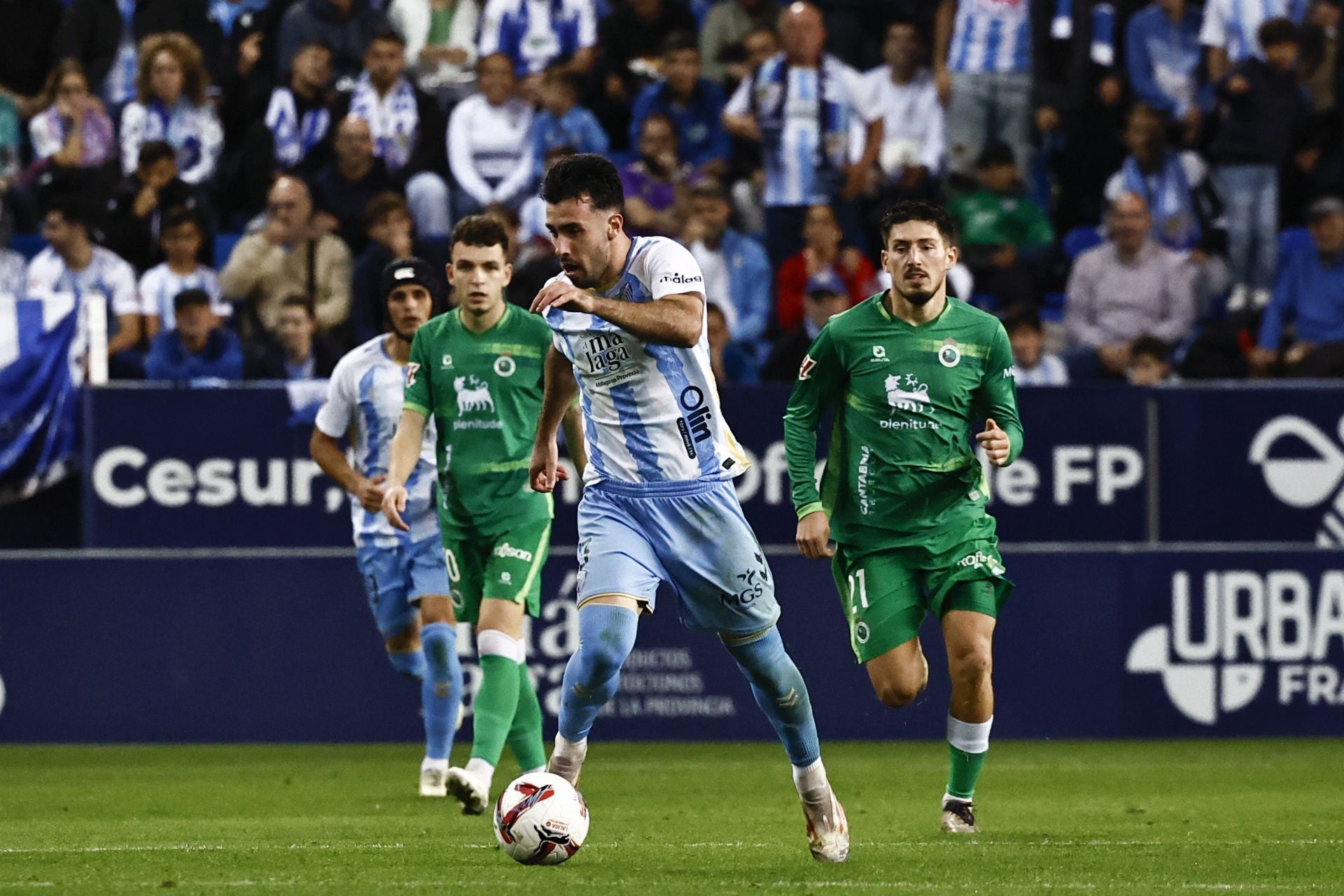 El Málaga - Racing, en imágenes