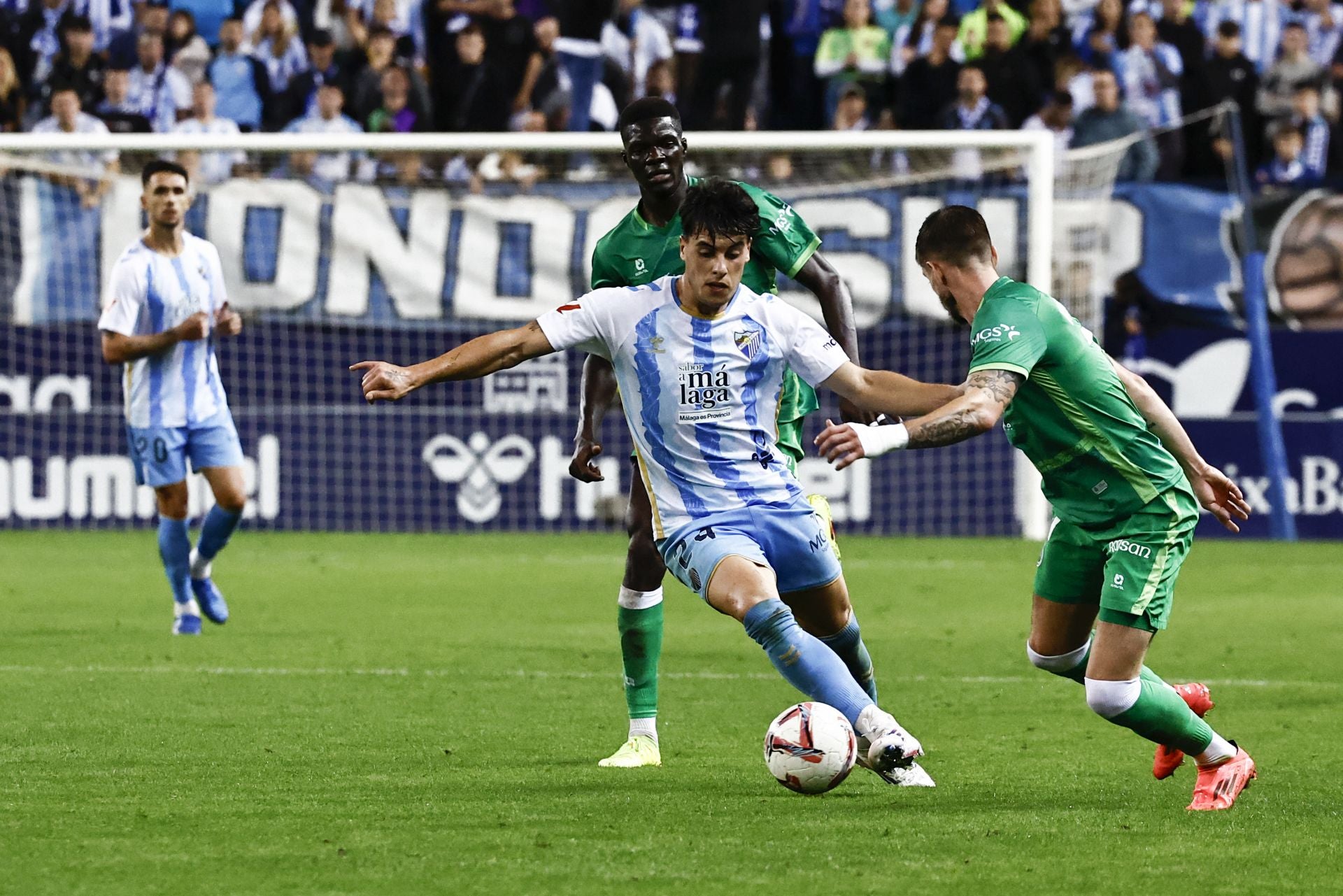 El Málaga - Racing, en imágenes