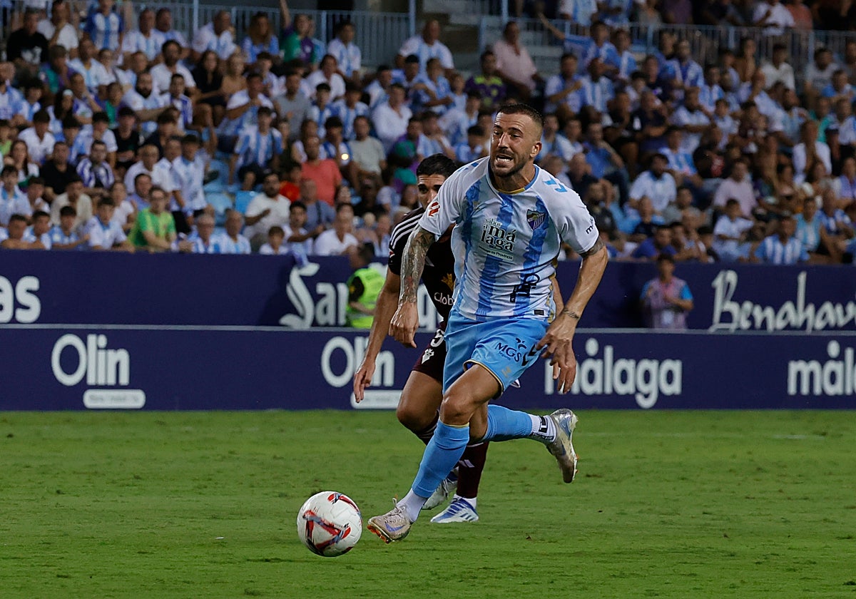 Dioni, en un partido del Málaga.