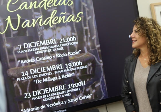 La concejal de Festejos presenta las candelas navideñas.