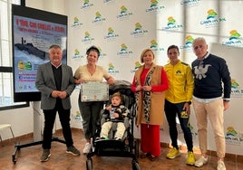 Acto de entrega de la recaudación de la prueba deportiva celebrada en Canillas de Albaida.